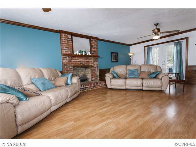 7317 Barkbridge Road Chesterfield, VA 23832 - Photo 4 of 24 a living room with furniture and a flat screen tv