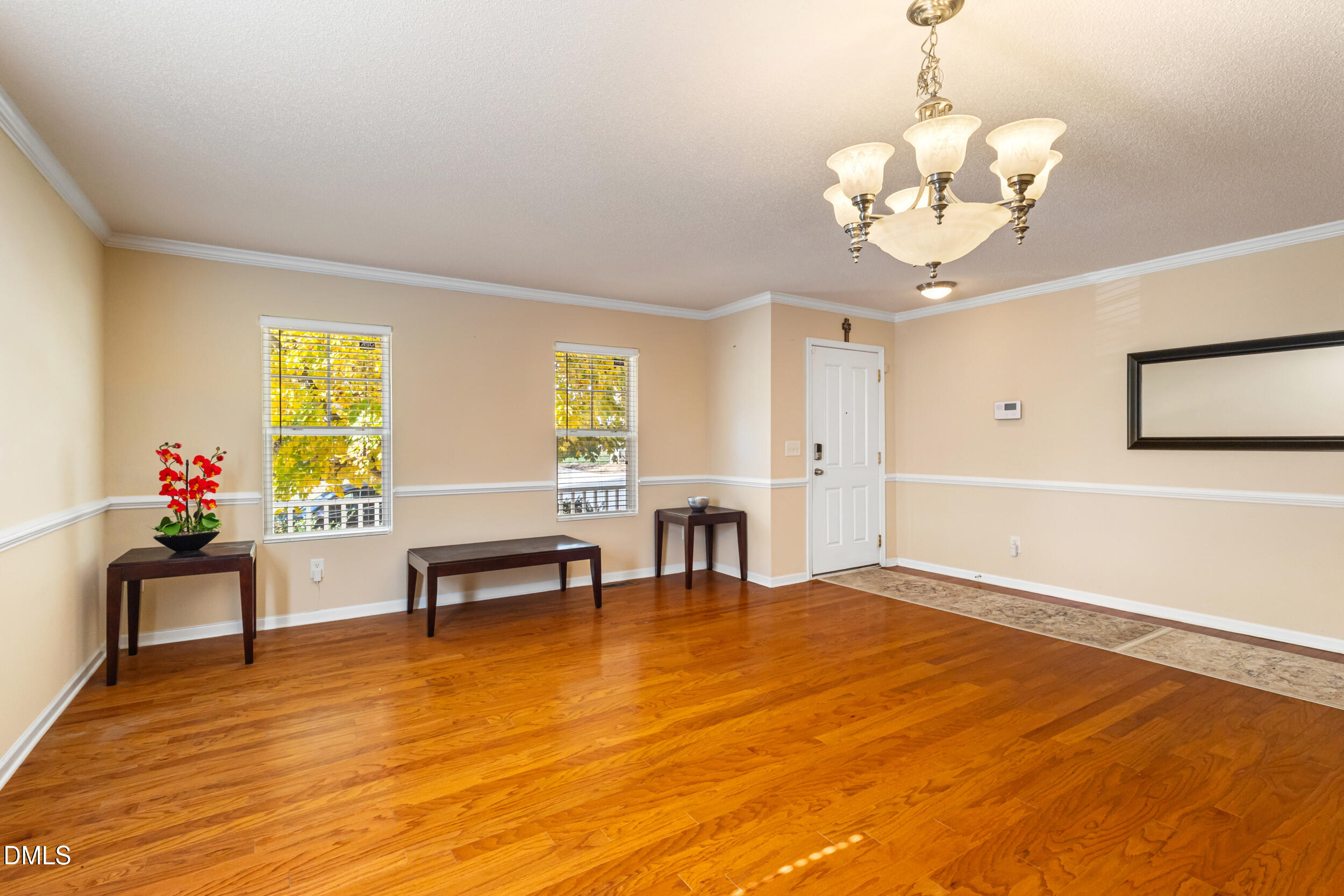 3748 Charleston Park Drive Raleigh, NC 27604 - Photo 14 of 34 a living room with furniture and a table