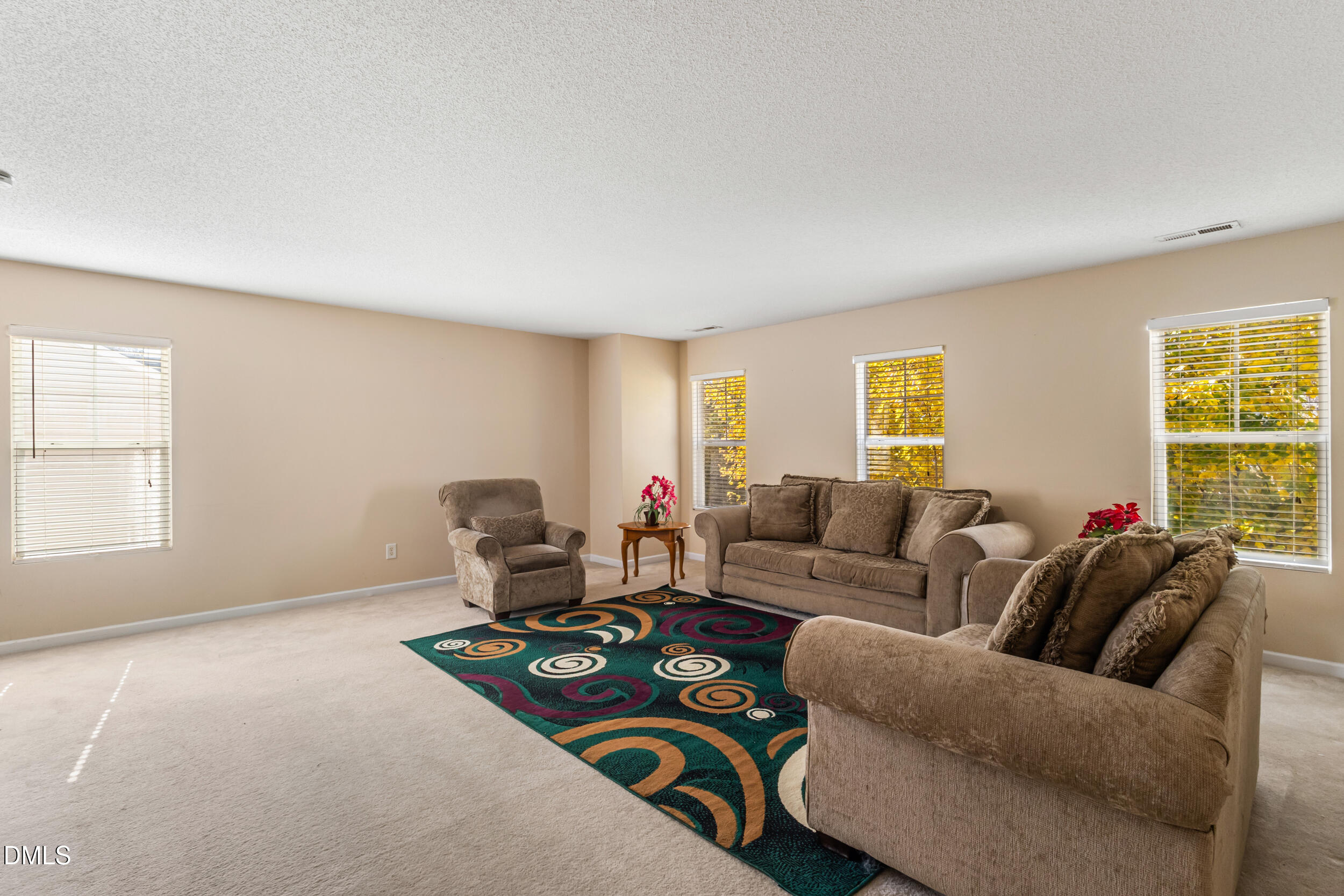 3748 Charleston Park Drive Raleigh, NC 27604 - Photo 24 of 34 a living room with furniture and a window