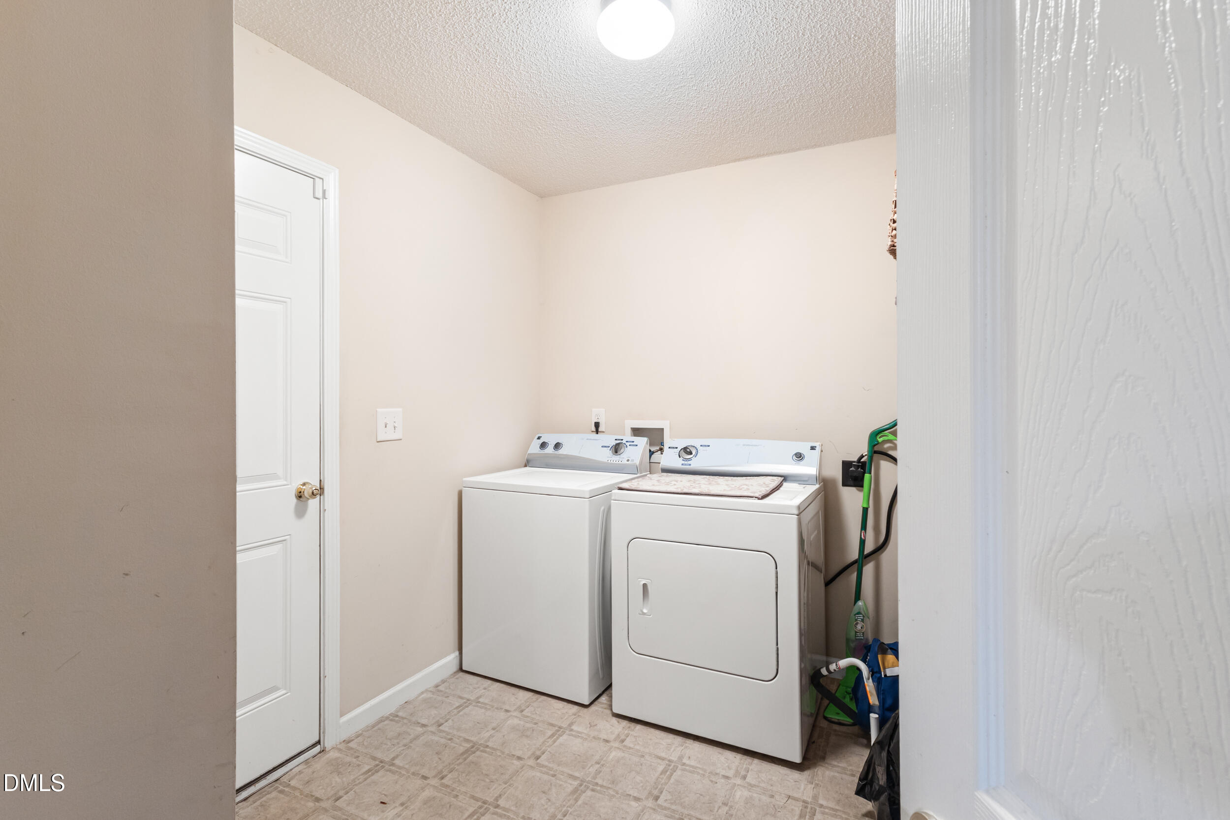 3748 Charleston Park Drive Raleigh, NC 27604 - Photo 27 of 34 a utility room with dryer and washer