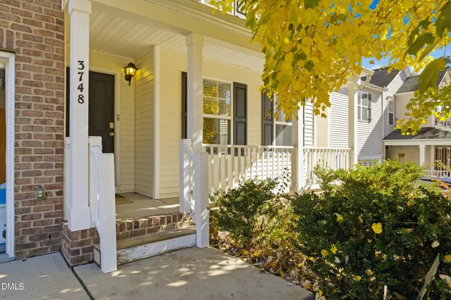 front view of a house with a small yard