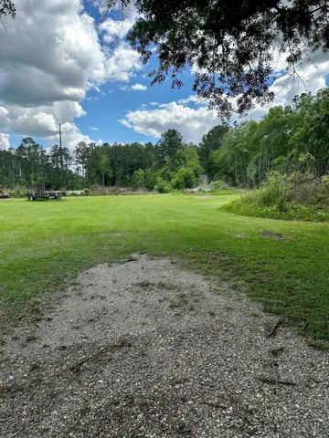 a view of field with green space