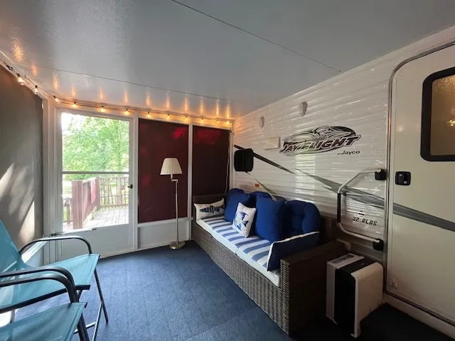 a view of a park with large trees