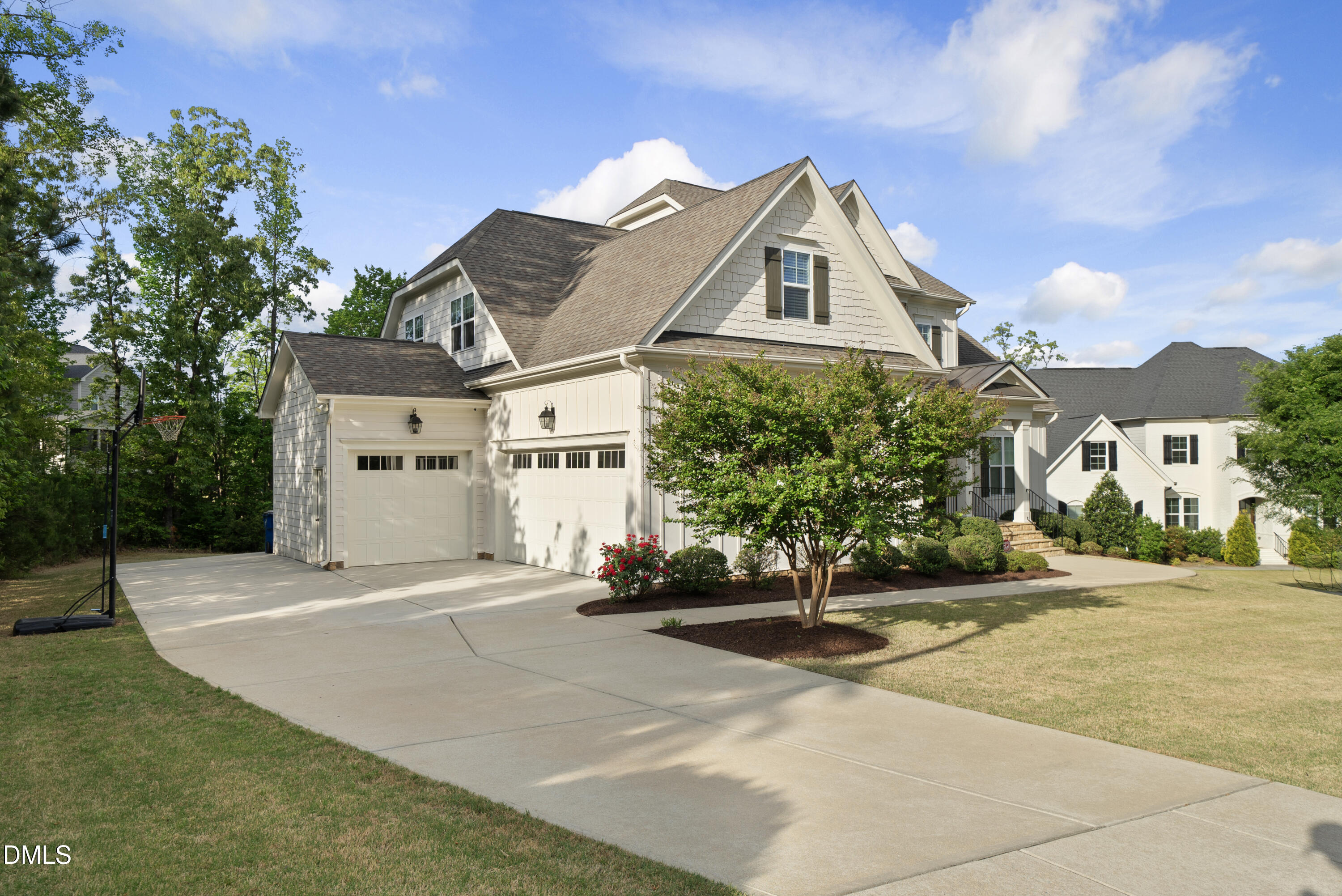 5109 Wainscott Way Raleigh, NC 27612 - Photo 2 of 52 a front view of a house with a yard