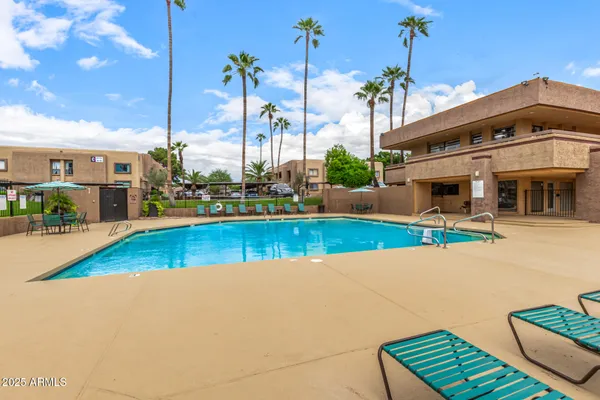 a view of a house with a swimming pool