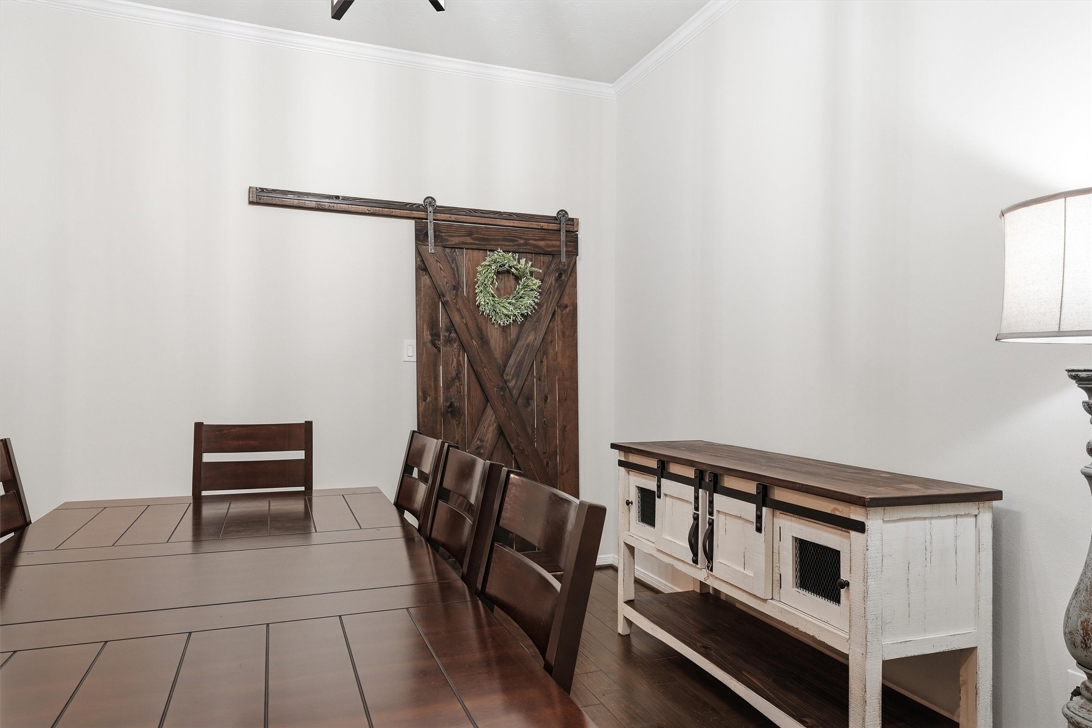 7131 Limestone Circle Manvel, TX 77578 - Photo 7 of 40 The custom barn door adds a designers touch and great character.