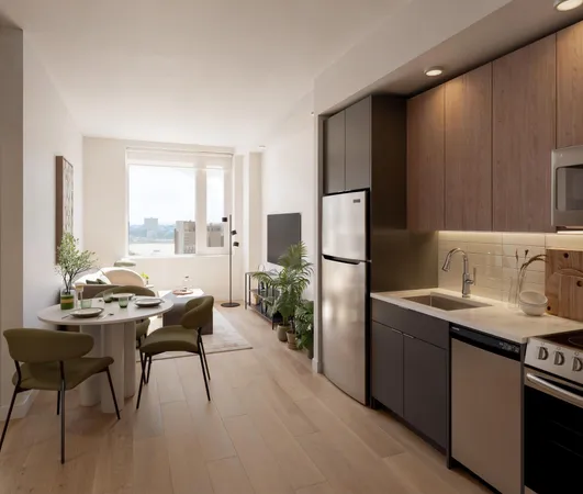 a kitchen with a table chairs refrigerator and cabinets