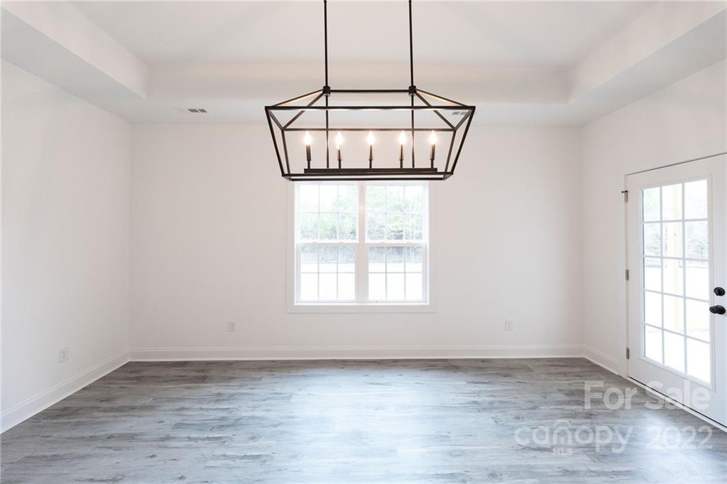 2231 State Rd S-46-1474, Unit 17 Clover, SC 29710 - Photo 15 of 20 a view of a room with a window wooden floor and windows