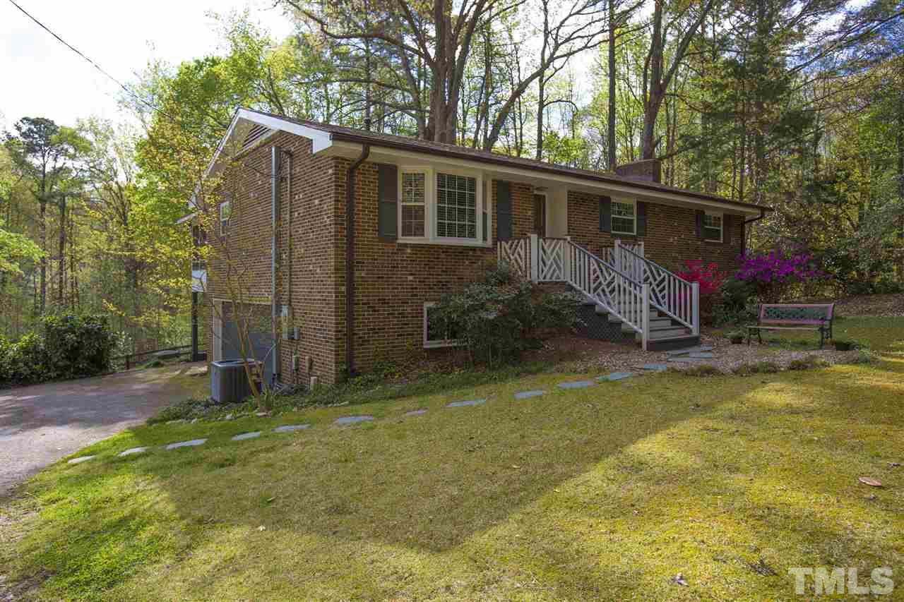 11100 Creedmoor Road Raleigh, NC 27614 - Photo 1 of 25 a view of a back yard of the house