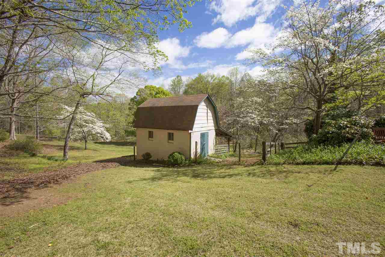 11100 Creedmoor Road Raleigh, NC 27614 - Photo 3 of 25 a view of a house with a yard