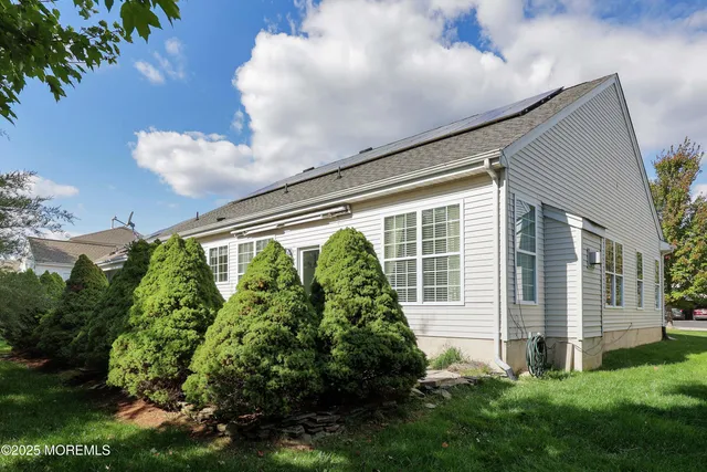 a house view with a garden space