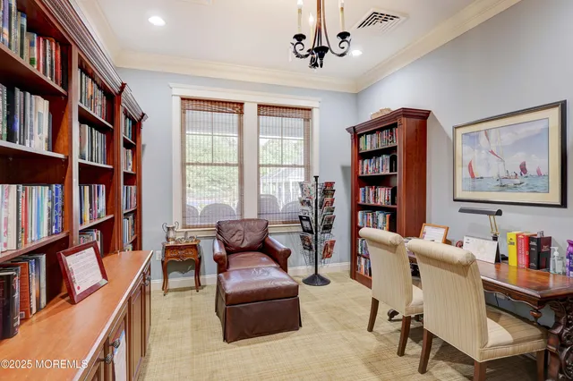 a living room with lots of furniture and a flat screen tv