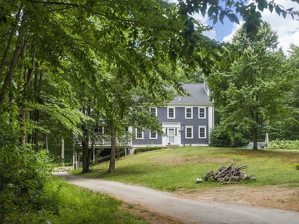 102 B Lunenburg Road Townsend, MA 01474 - Photo 1 of 41 a view of a house with a yard