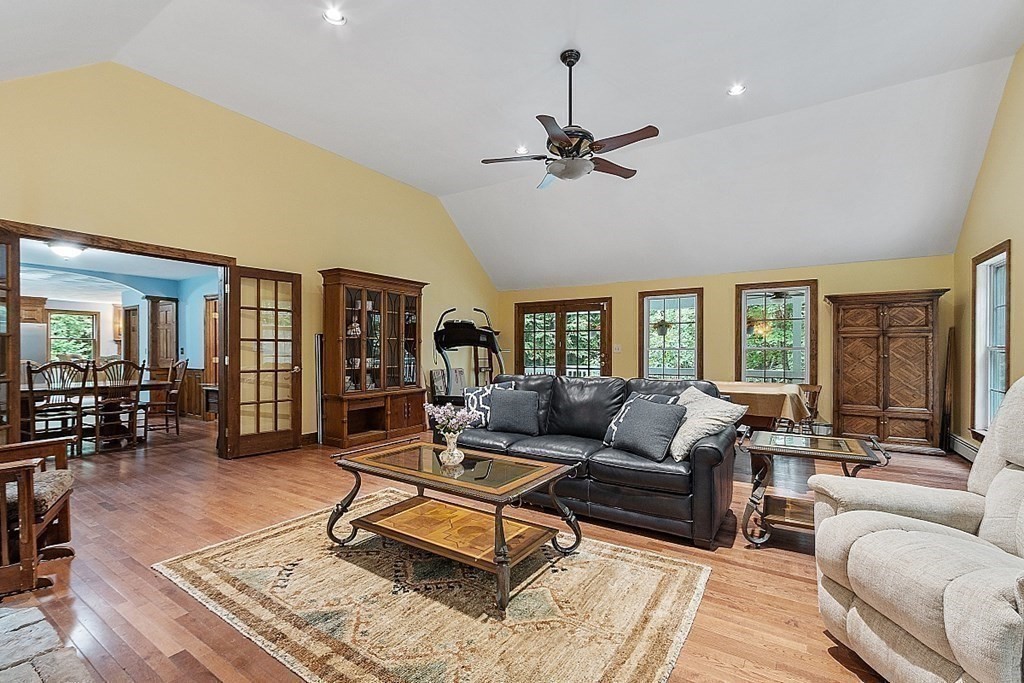 102 B Lunenburg Road Townsend, MA 01474 - Photo 17 of 41 a living room with furniture ceiling fan and a window