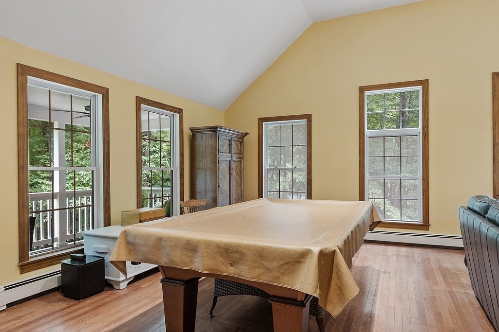 102 B Lunenburg Road Townsend, MA 01474 - Photo 18 of 41 a view of a dining room with furniture and wooden floor