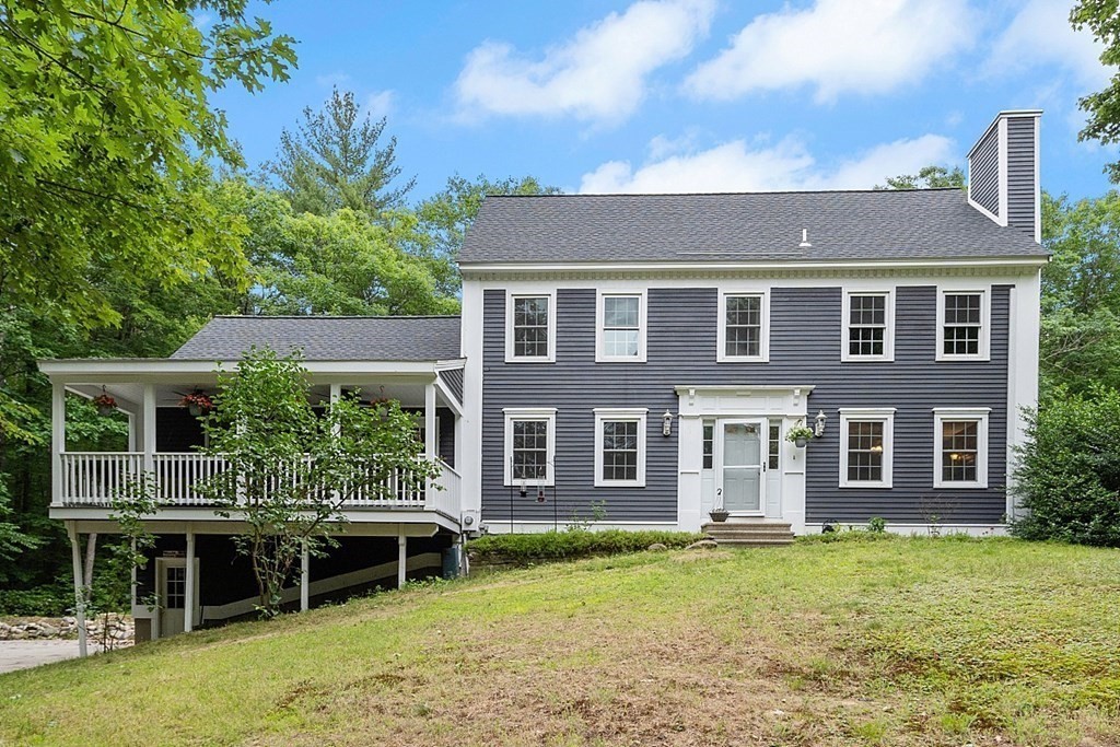 102 B Lunenburg Road Townsend, MA 01474 - Photo 2 of 41 a front view of a house with a yard