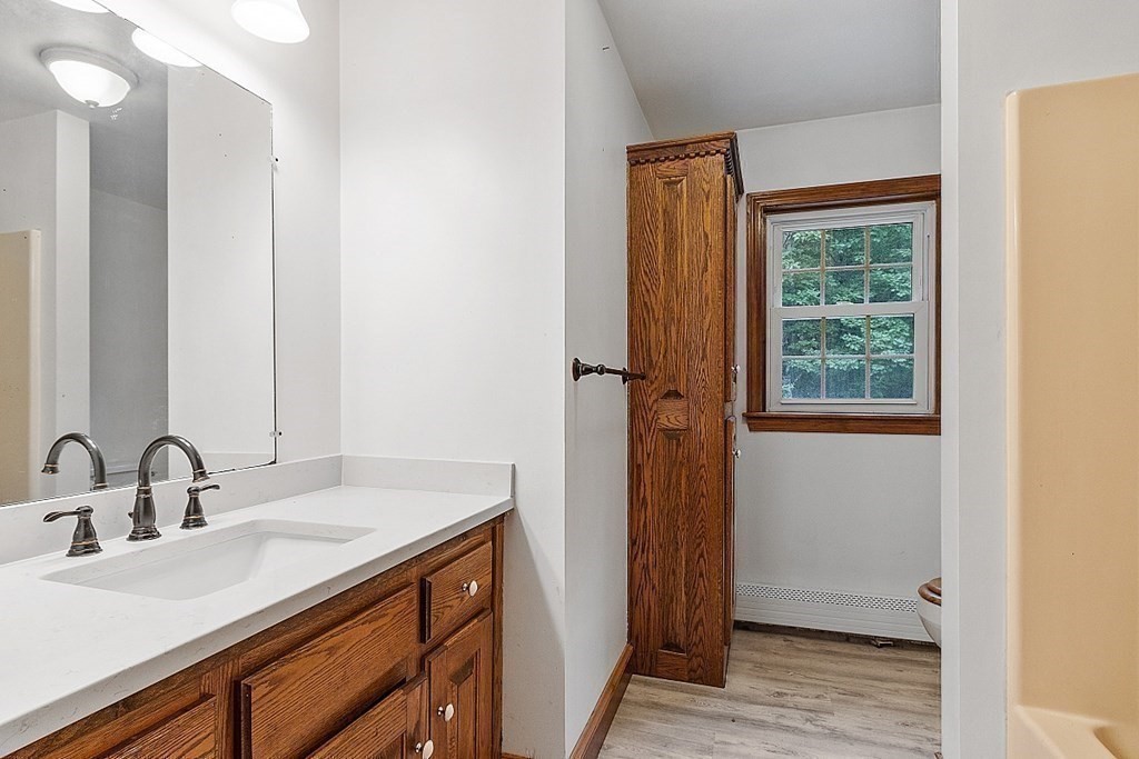 102 B Lunenburg Road Townsend, MA 01474 - Photo 23 of 41 a bathroom with a sink and a mirror