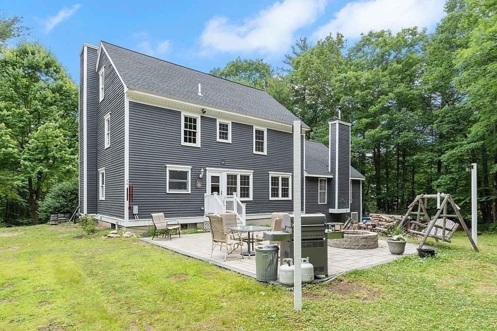 102 B Lunenburg Road Townsend, MA 01474 - Photo 29 of 41 a house view with swimming pool and sitting space