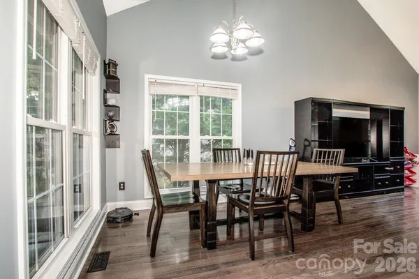 a kitchen with stainless steel appliances white cabinets and a sink