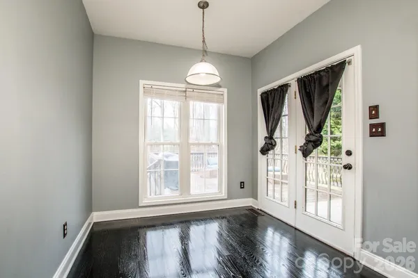 a kitchen with stainless steel appliances a refrigerator and a stove top oven