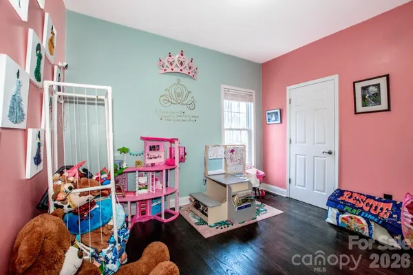 a view of a chair and table in the balcony
