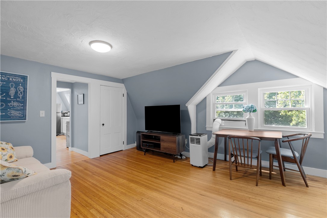 44 Bliss Mine Road, Unit 8 Middletown, RI 02842 - Photo 4 of 25 Living Room with Dining Area