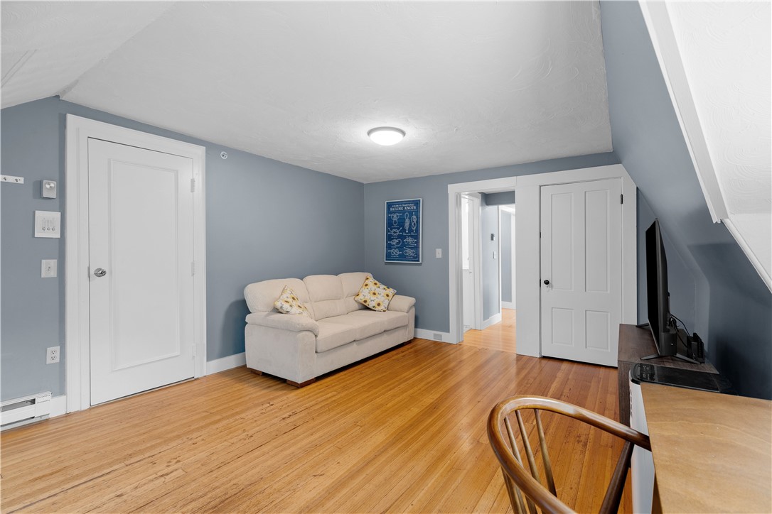 44 Bliss Mine Road, Unit 8 Middletown, RI 02842 - Photo 5 of 25 Living Room with View to Kitchen