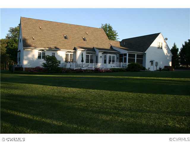 1826 Rabbit Warren Road Manakin-Sabot, VA 23103 - Photo 12 of 12 a view of a big house with a big yard