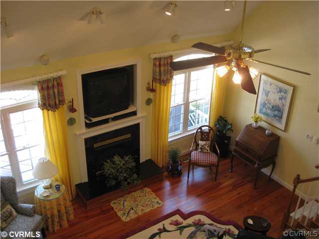 1826 Rabbit Warren Road Manakin-Sabot, VA 23103 - Photo 5 of 12 a living room with furniture fireplace and flat screen tv