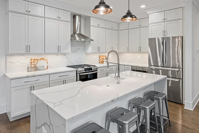 a bedroom with furniture and a table