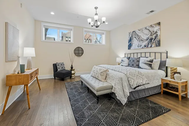 a bedroom with a book shelf and a book shelf