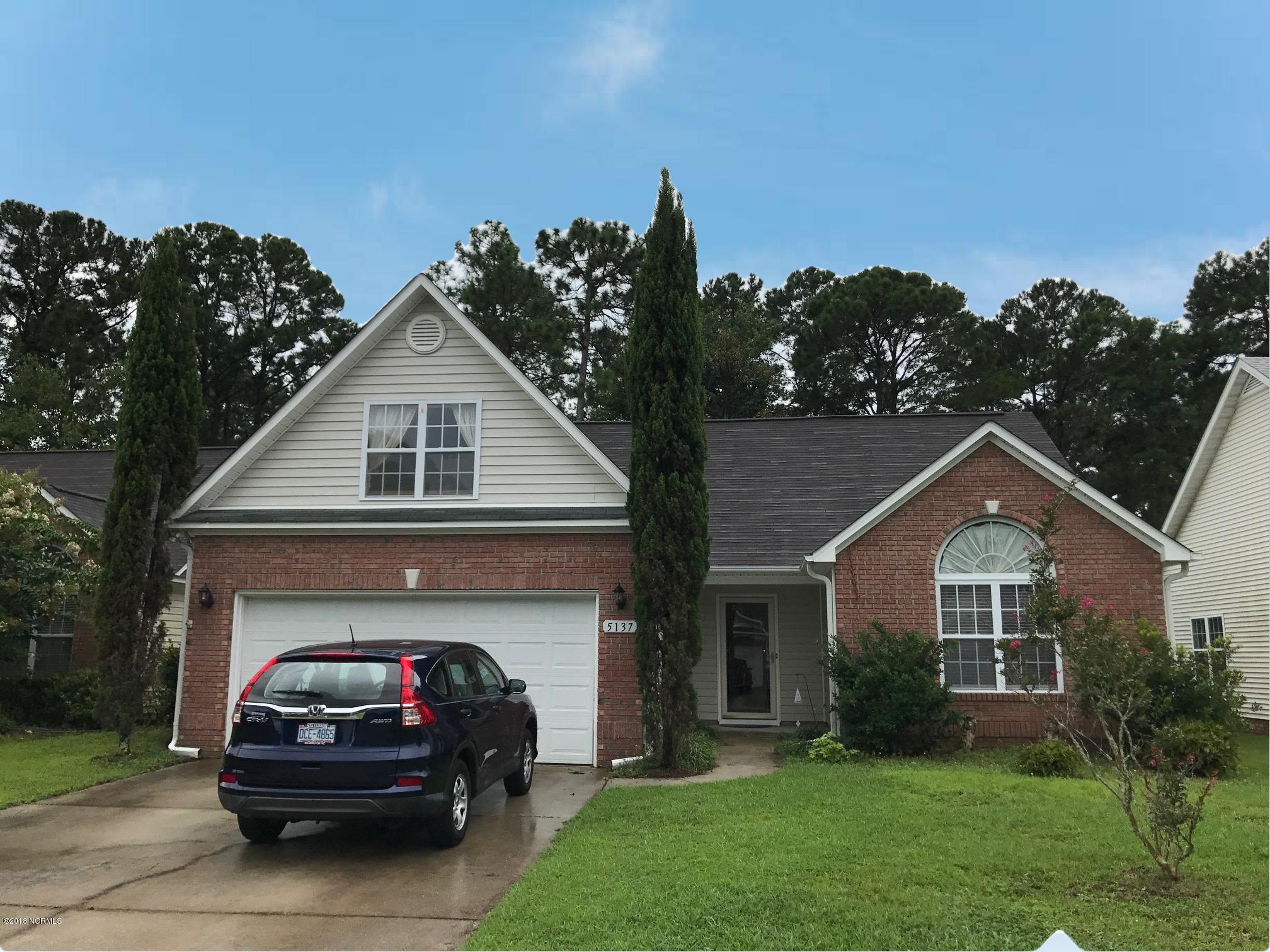 5137 Long Pointe Road Wilmington, NC 28409 - Photo 1 of 34 #1 with Blue Sky