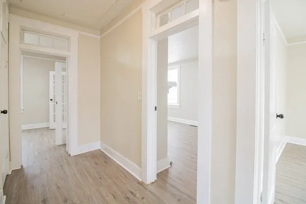 a view of entryway with wooden floor