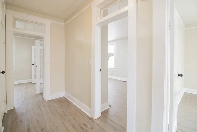 a view of entryway with wooden floor