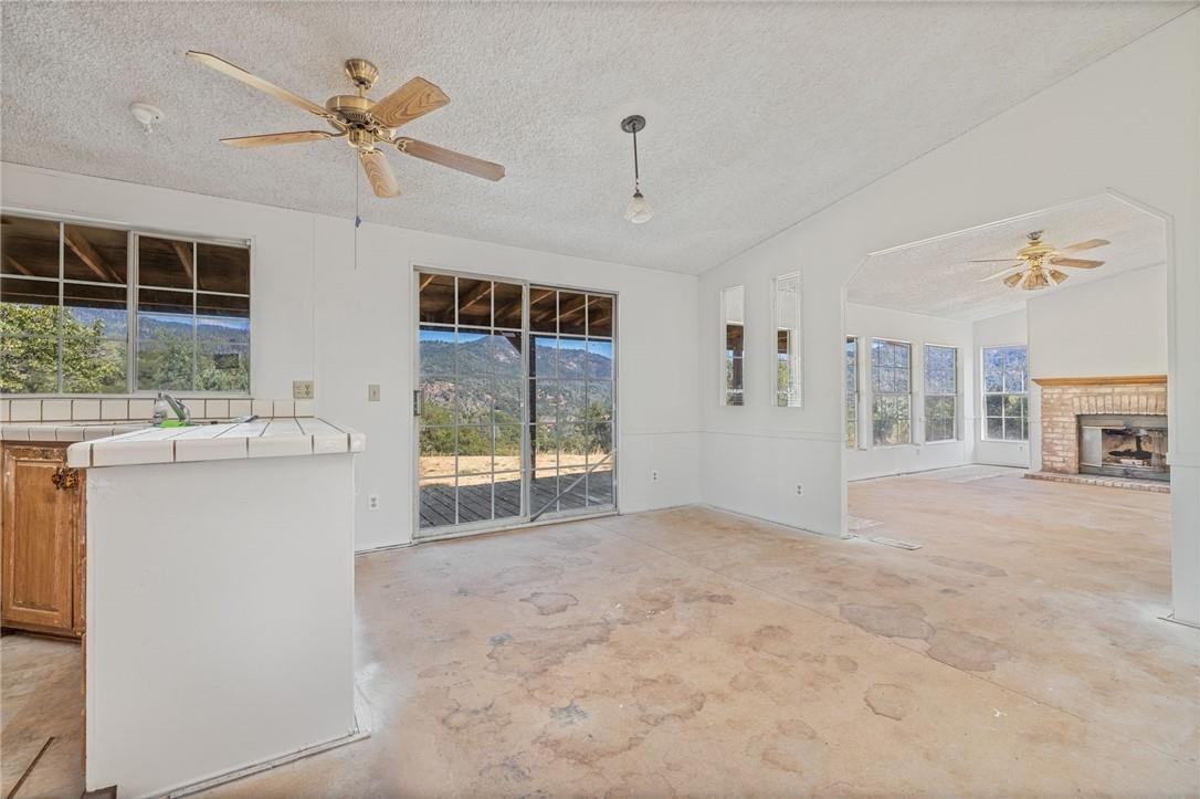 4966 Watt Road Ahwahnee, CA 93601 - Photo 21 of 56 Dining Room with a view. Photo taken before the new carpet was installed.