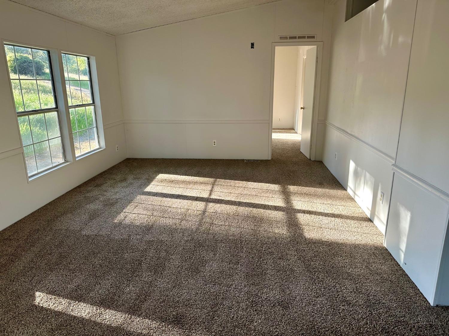 4966 Watt Road Ahwahnee, CA 93601 - Photo 3 of 56 Newly installed carpet in the living room.