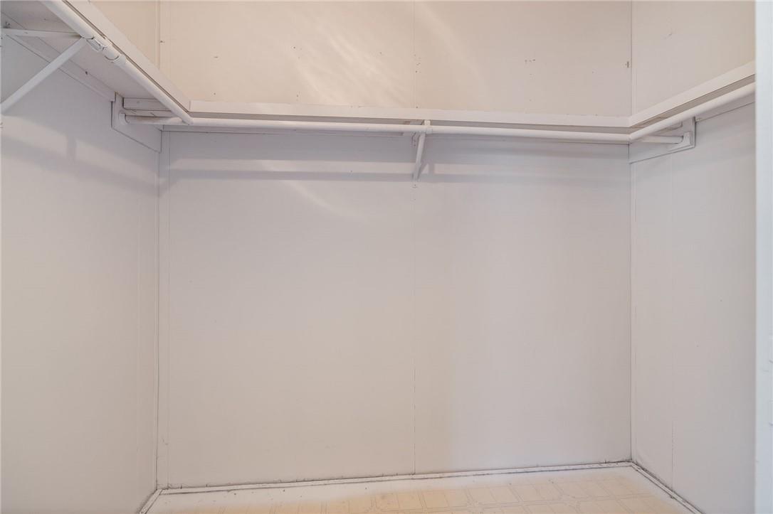 4966 Watt Road Ahwahnee, CA 93601 - Photo 31 of 56 Primary suite walk in closet. Photo taken before the new carpet was installed.