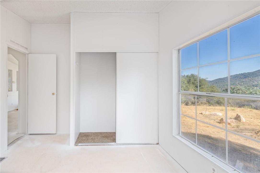 4966 Watt Road Ahwahnee, CA 93601 - Photo 35 of 56 Bedroom with a view. Photo taken before the new carpet was installed.