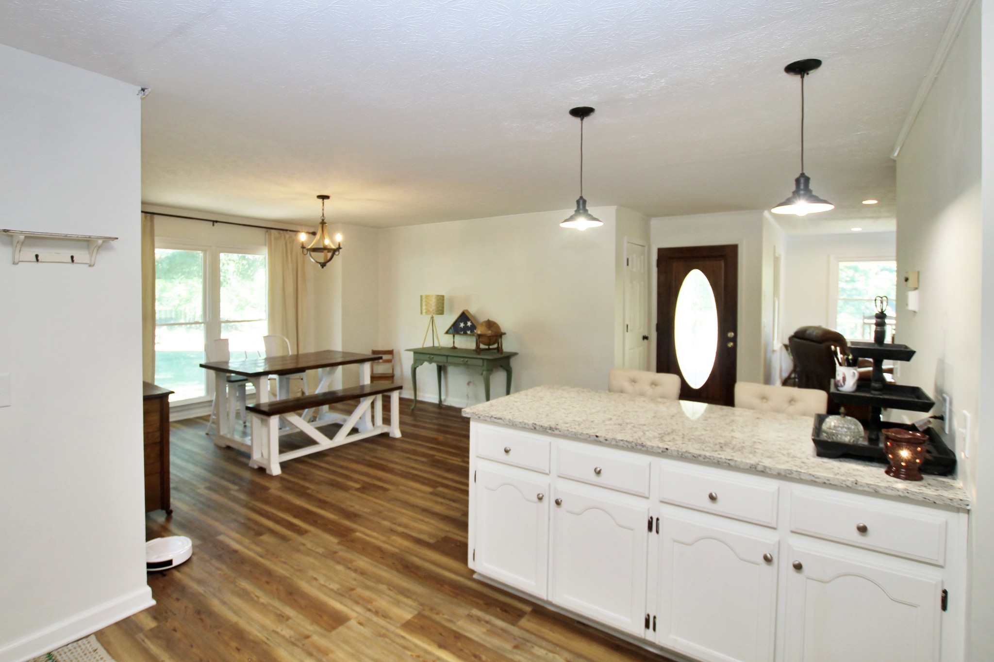 101 Timberlake Drive Springfield, TN 37172 - Photo 12 of 38 a spacious kitchen with stainless steel appliances granite countertop a sink dishwasher with wooden floor
