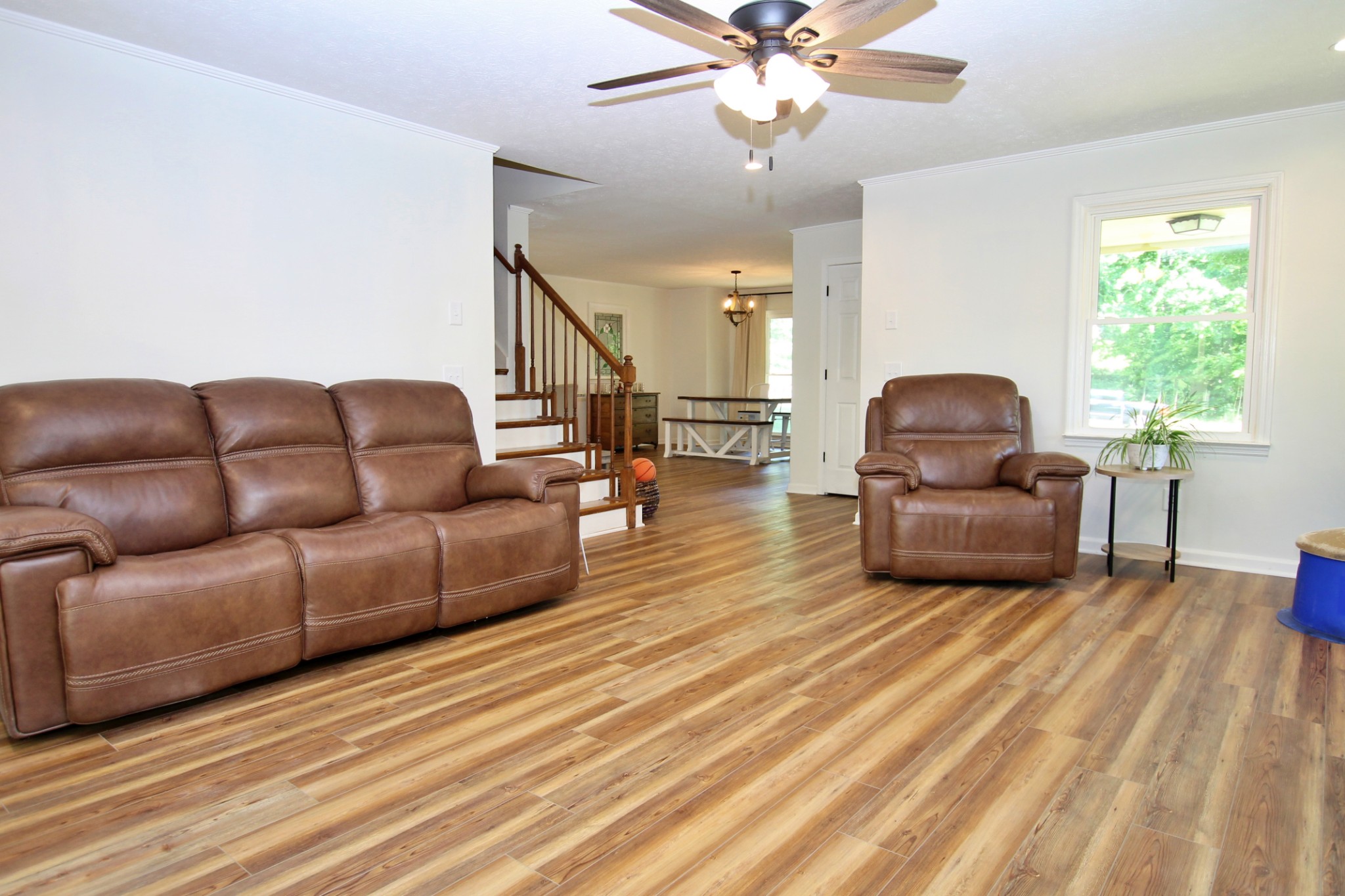 101 Timberlake Drive Springfield, TN 37172 - Photo 17 of 38 a living room with furniture and a chandelier