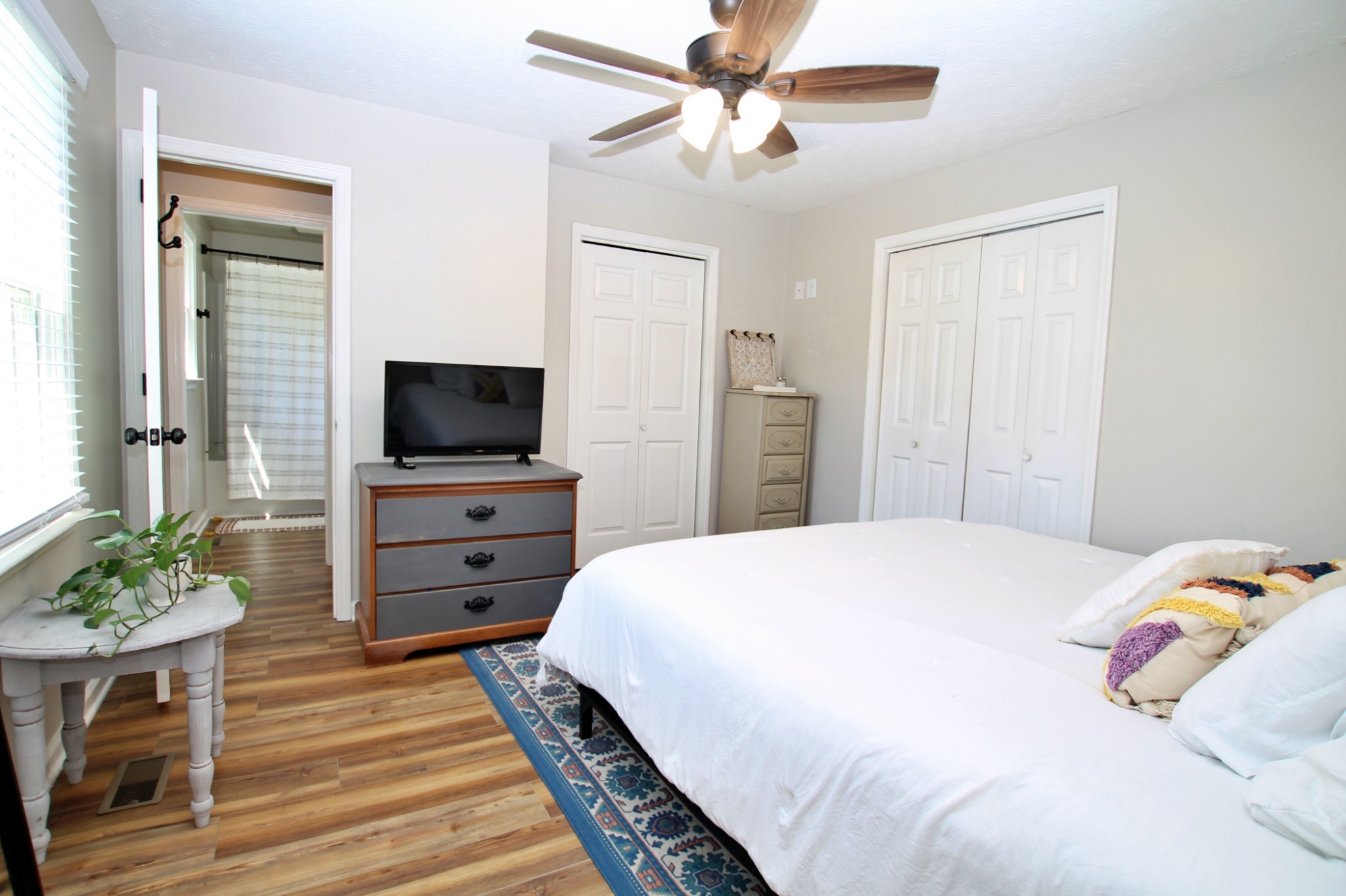 101 Timberlake Drive Springfield, TN 37172 - Photo 19 of 38 a bedroom with a bed and a flat screen tv
