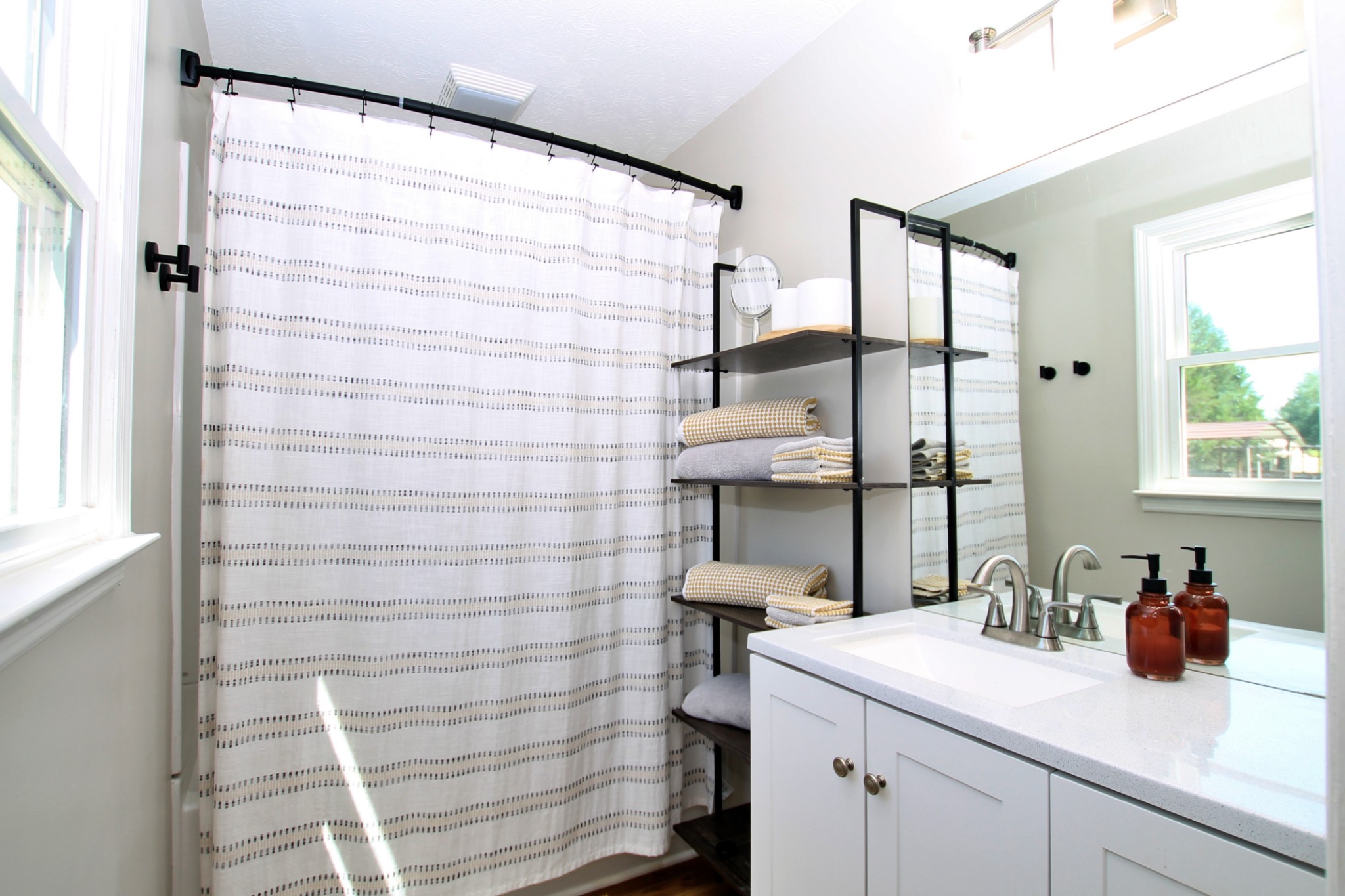 101 Timberlake Drive Springfield, TN 37172 - Photo 21 of 38 a bathroom with a sink and a mirror