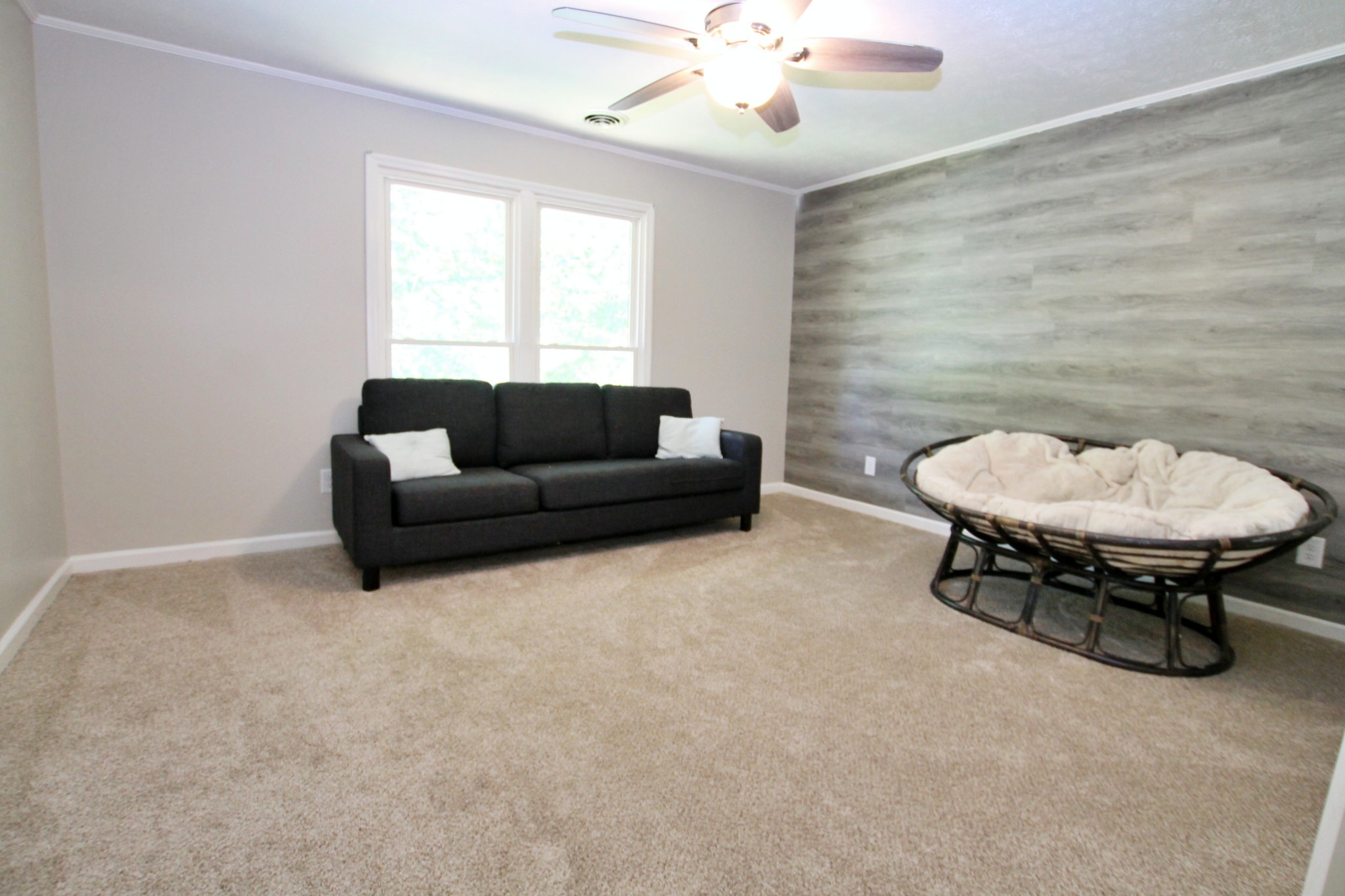 101 Timberlake Drive Springfield, TN 37172 - Photo 24 of 38 a living room with furniture and a chair