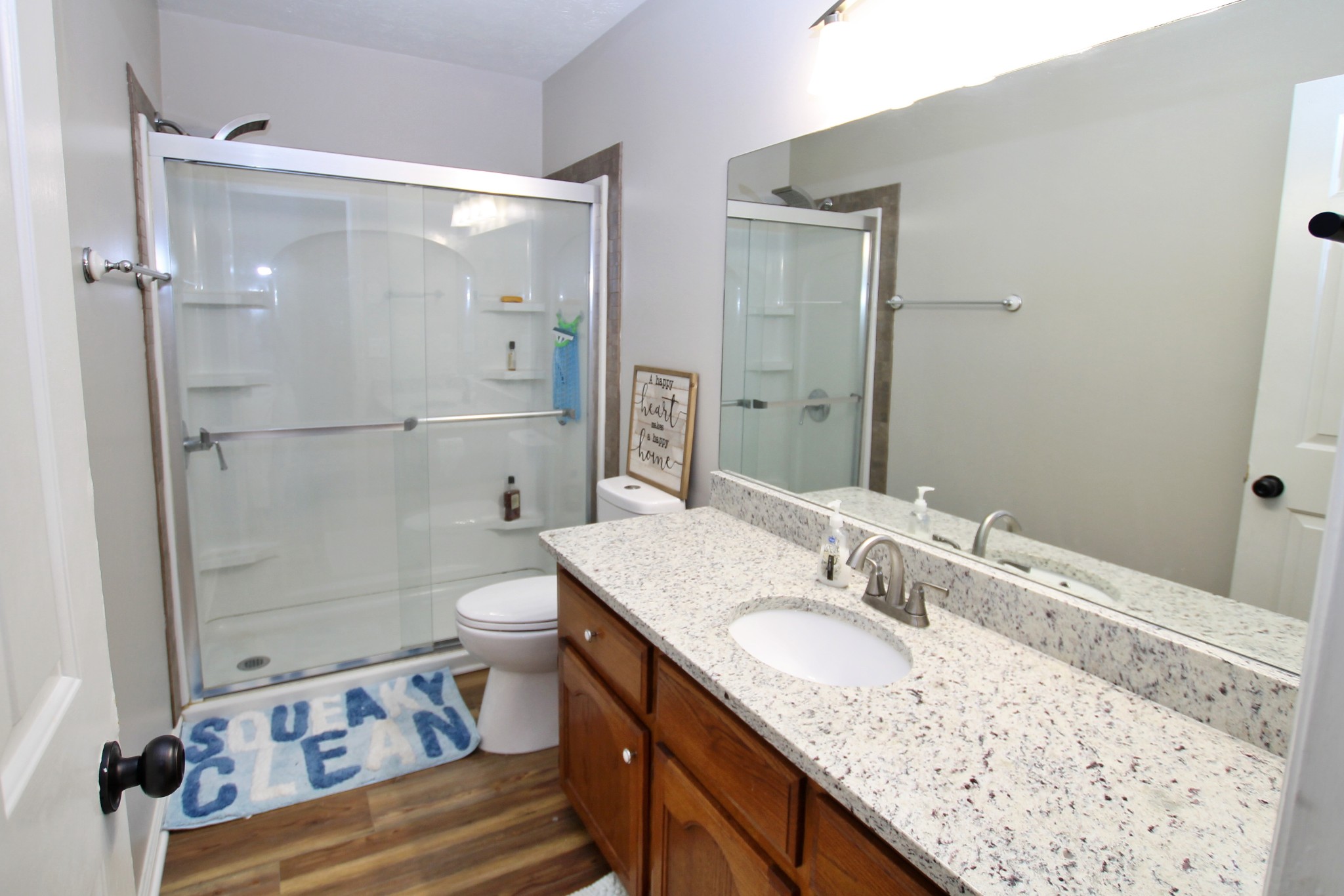 101 Timberlake Drive Springfield, TN 37172 - Photo 25 of 38 a bathroom with a granite countertop sink toilet and shower