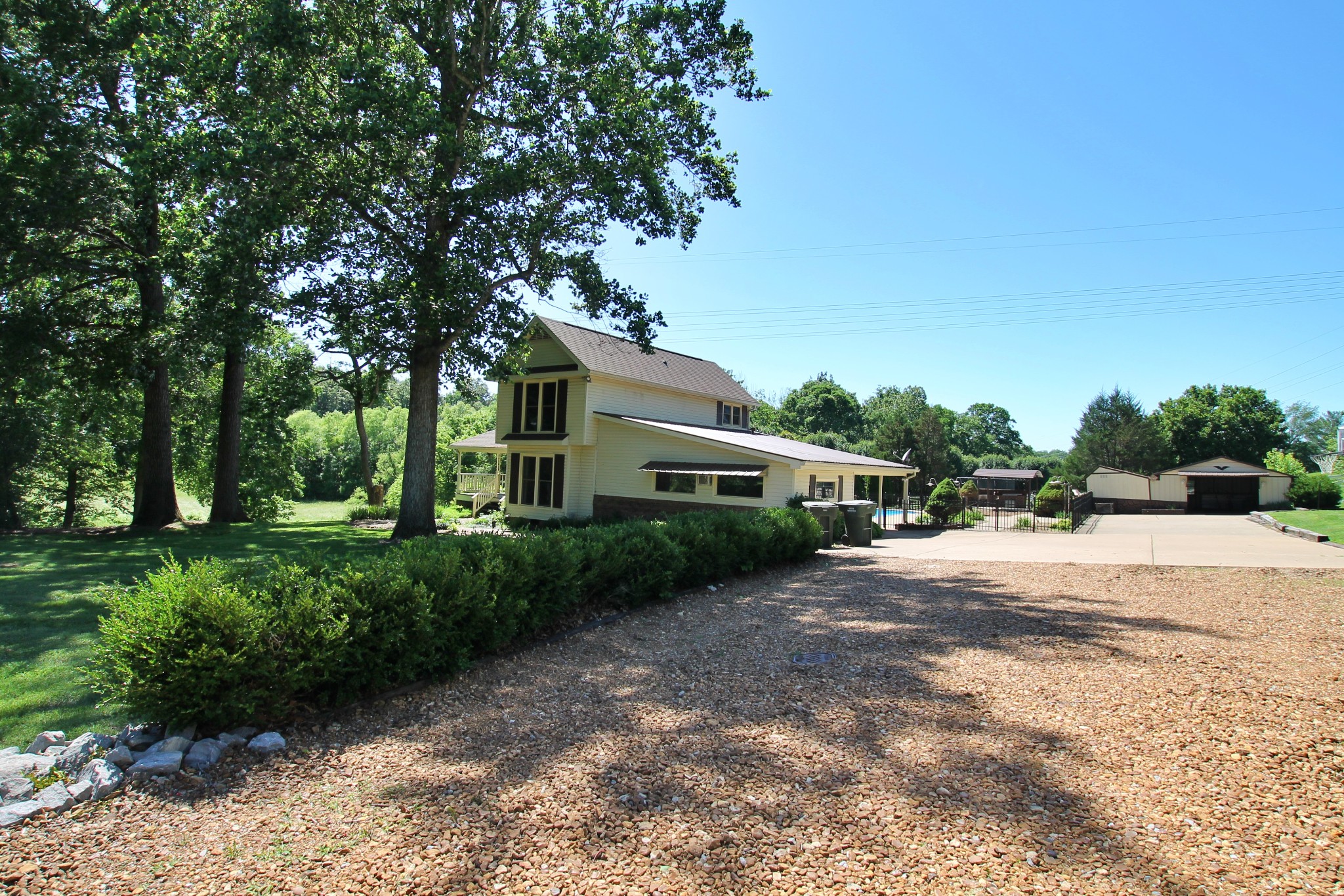 101 Timberlake Drive Springfield, TN 37172 - Photo 3 of 38 a front view of a house with a yard and trees