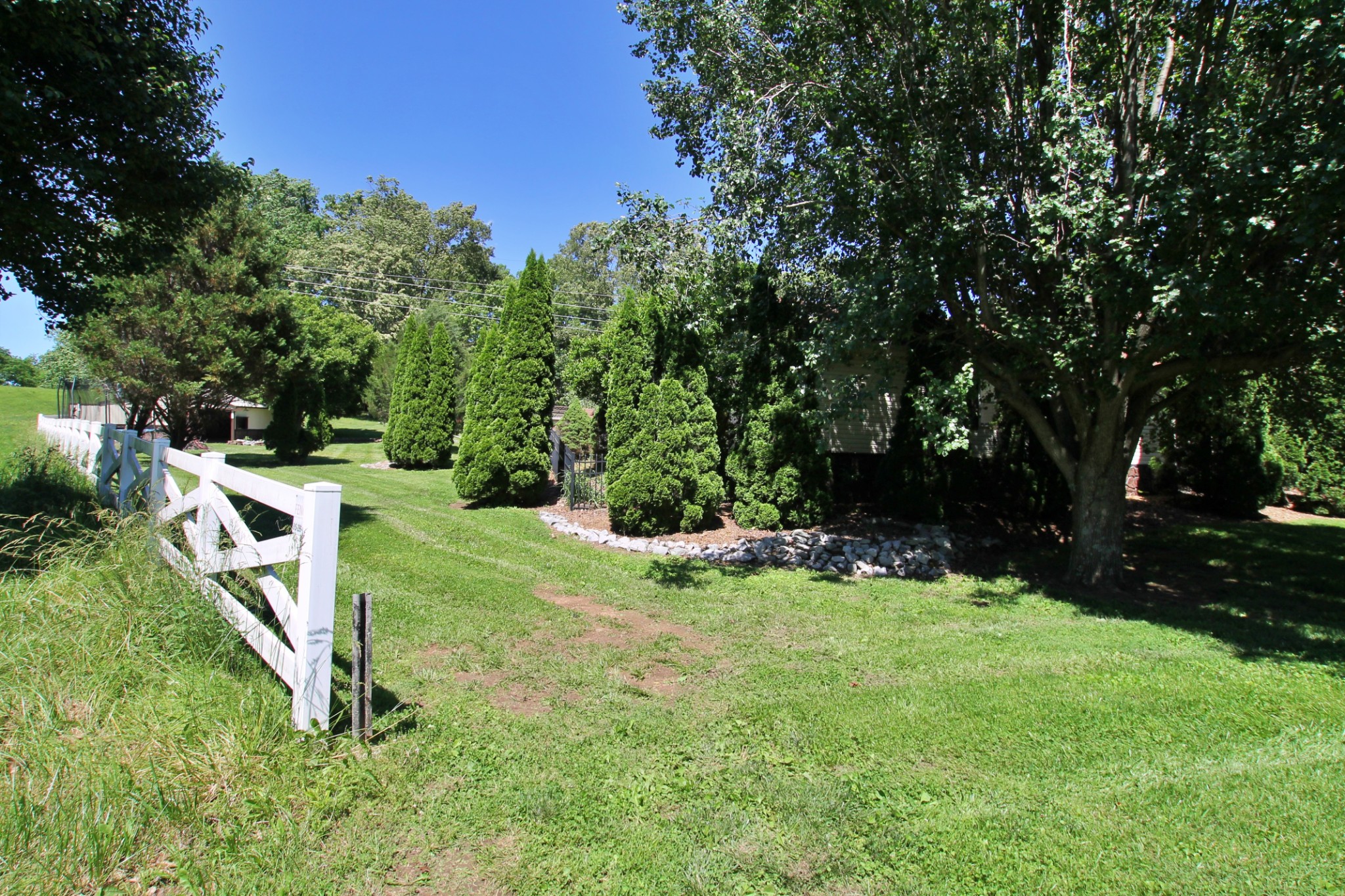 101 Timberlake Drive Springfield, TN 37172 - Photo 38 of 38 a backyard of a house with yard and trampoline