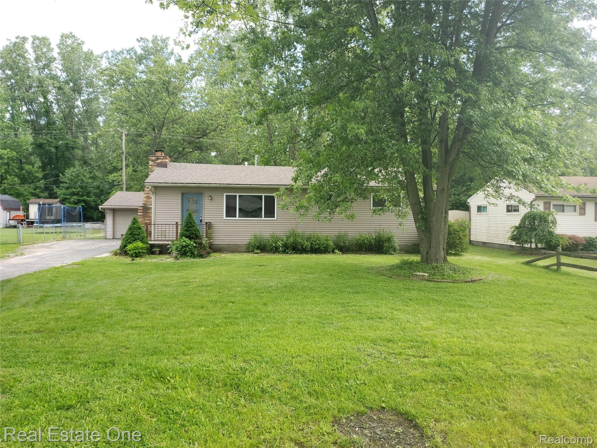 48653 Willis Road Belleville, MI 48111 - Photo 1 of 14 Front Yard