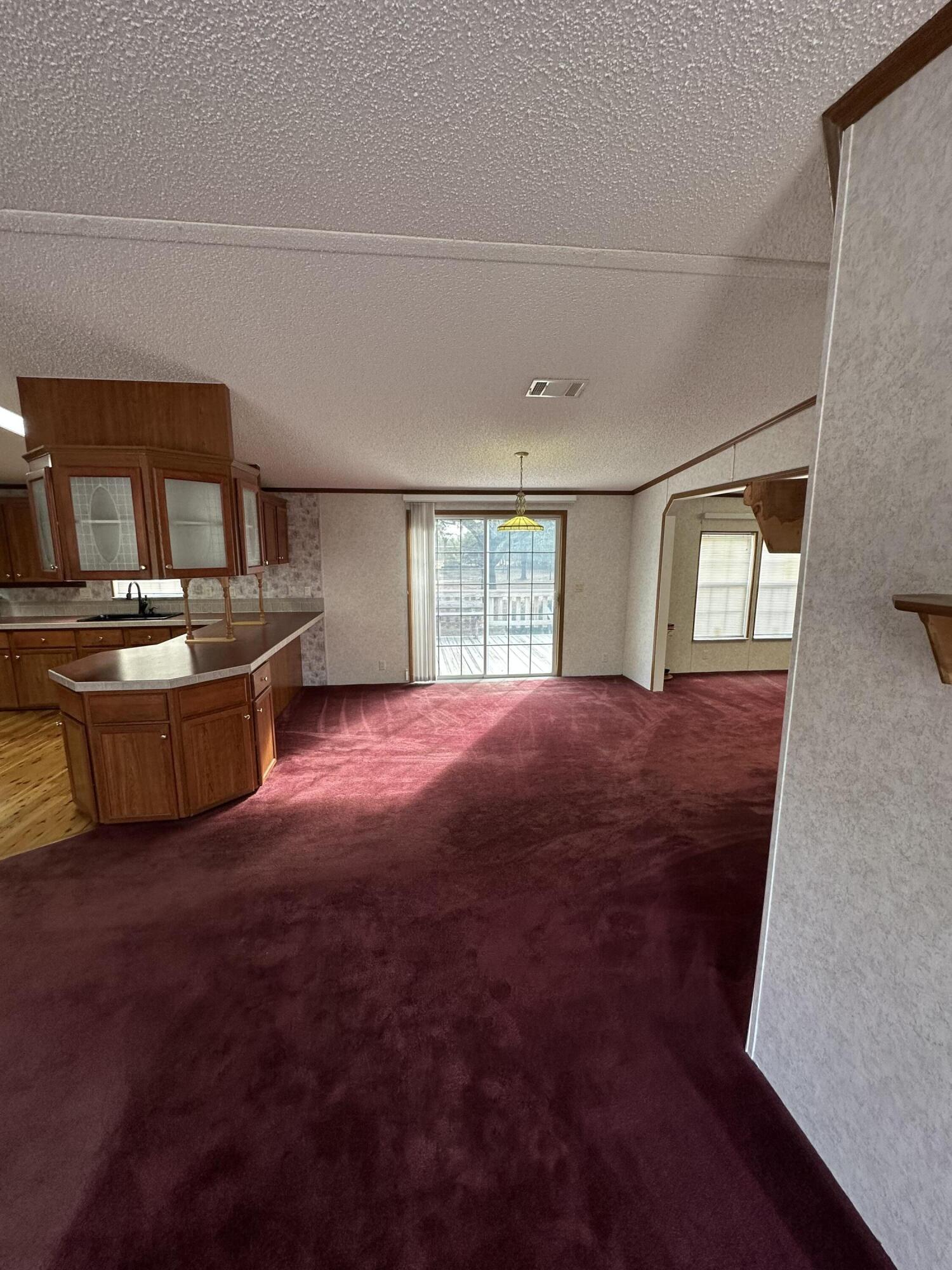 618 Oakridge Road DeFuniak Springs, FL 32433 - Photo 13 of 46 a view of livingroom with kitchen and furniture