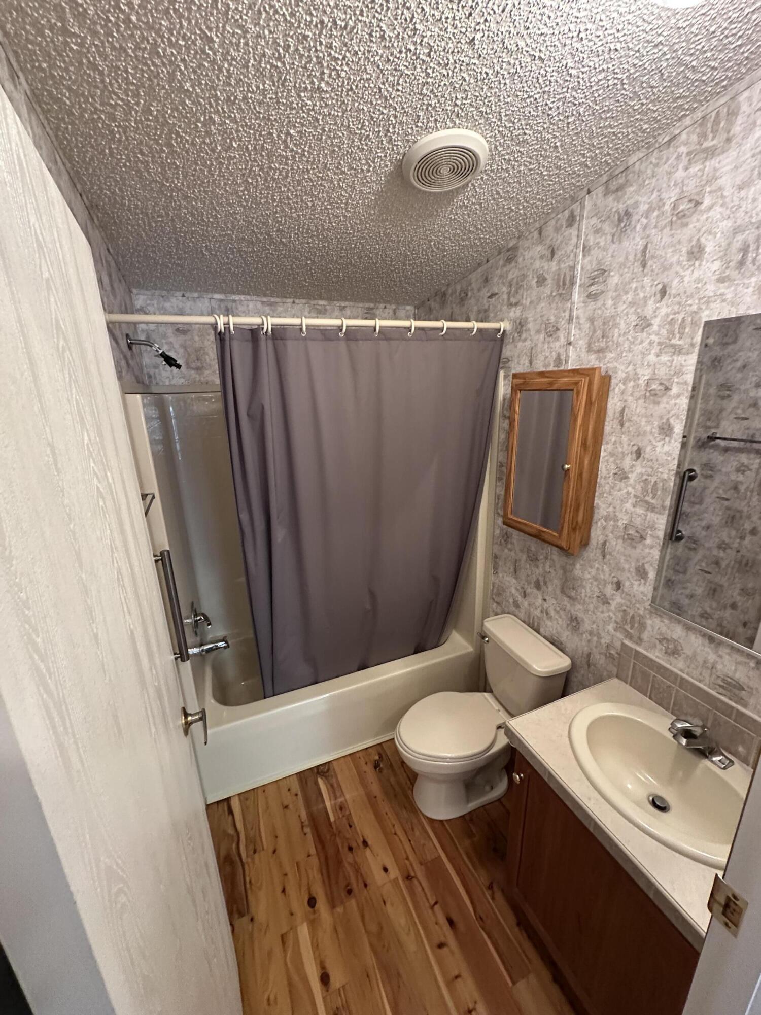 618 Oakridge Road DeFuniak Springs, FL 32433 - Photo 31 of 46 a bathroom with a sink and a mirror