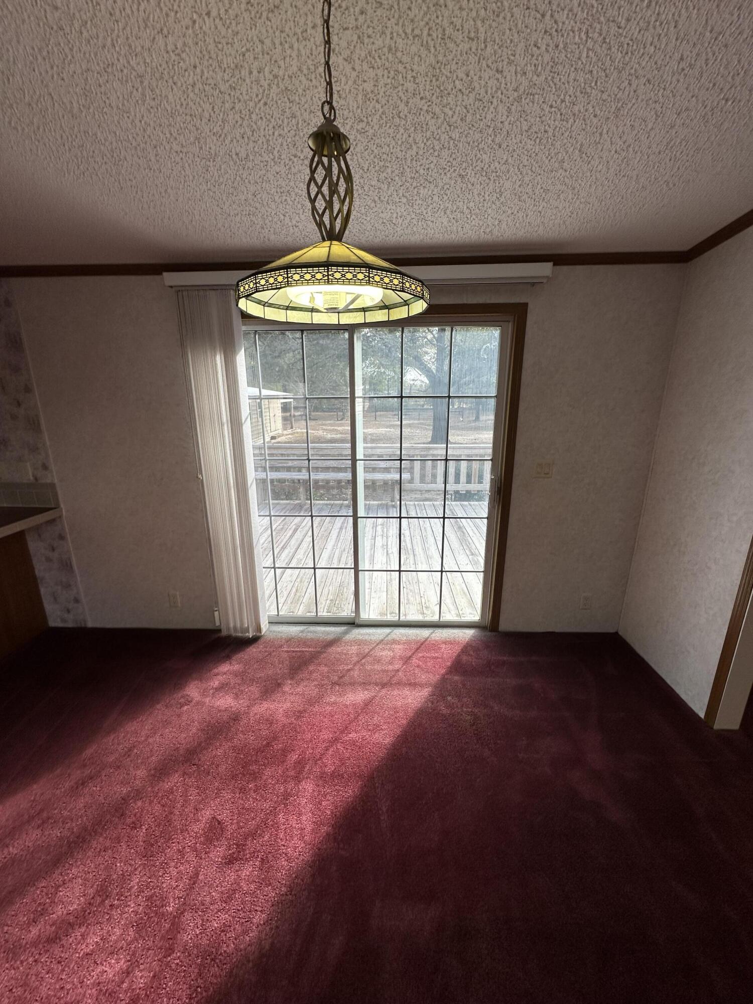 618 Oakridge Road DeFuniak Springs, FL 32433 - Photo 34 of 46 a view of an empty room with a window